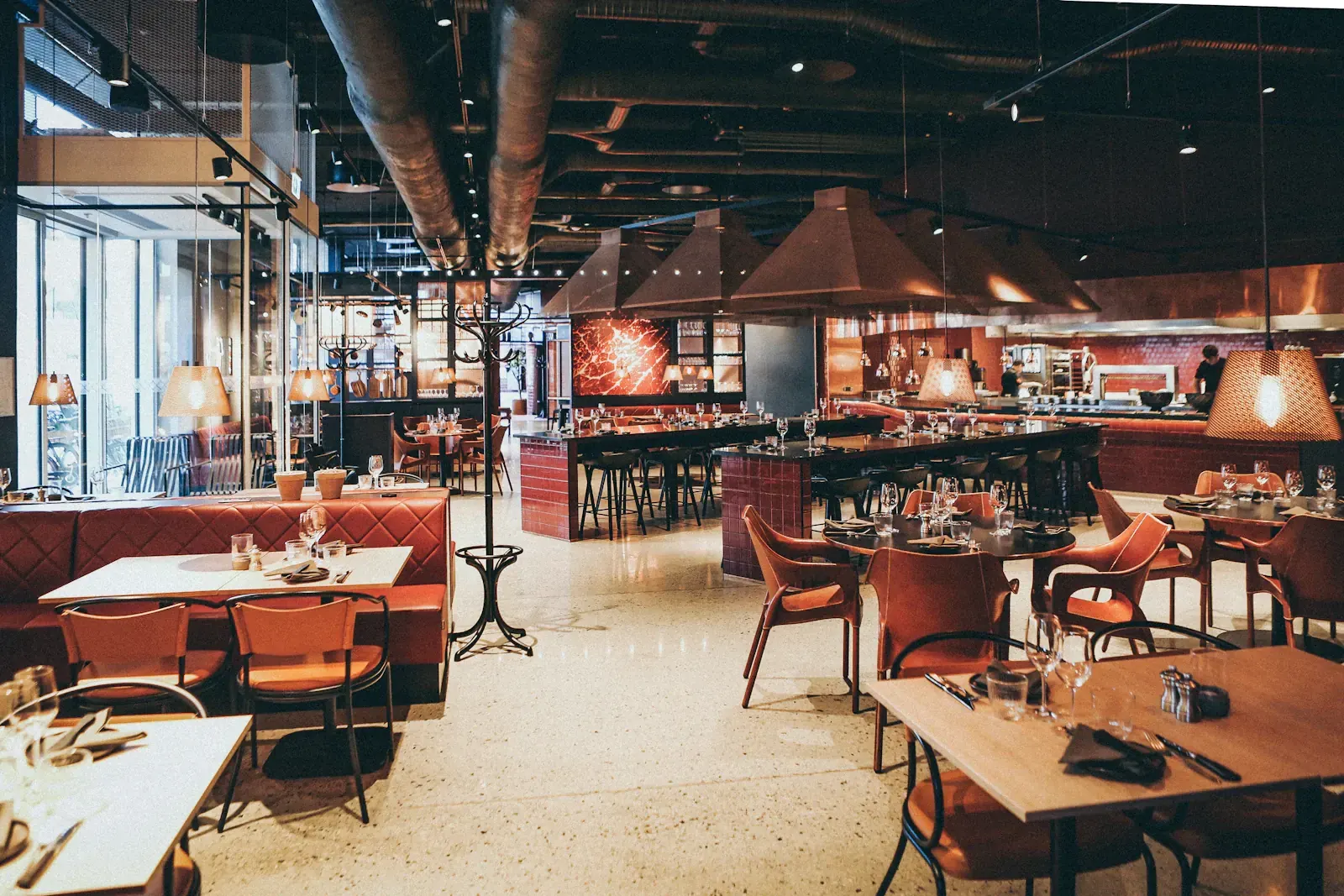 A warmly lit restaurant dining room